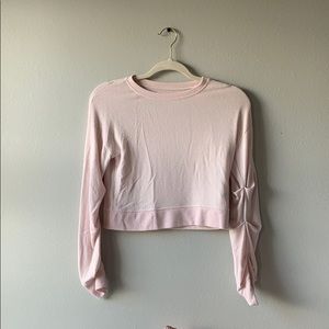Pink sweater.